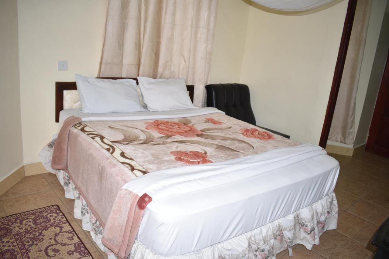 Rainbow Executive Lodge Boma la Ngombe Exterior foto